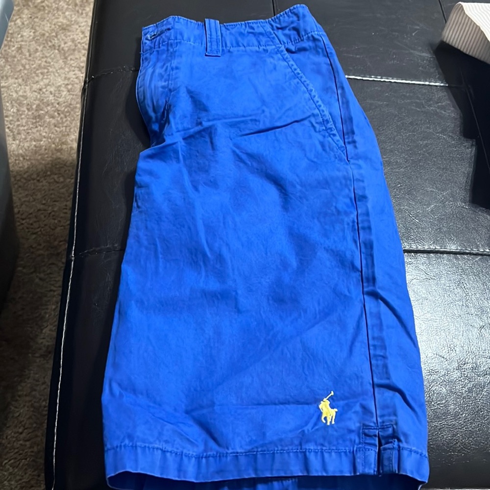 Polo boys shorts with yellow logo horse on the bottom front leg